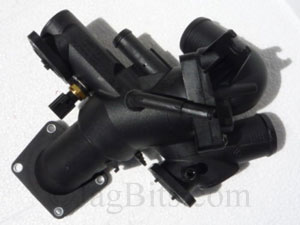 THERMOSTAT HOUSING AND OUTLET PIPE ASSEMBLY INCLUDES THERMOSTAT  AJ811793