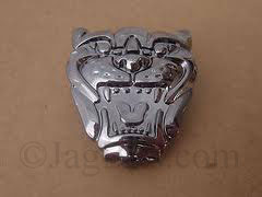 EMBLEM ON GRILL, CAT FACE BADGE  C2S8839